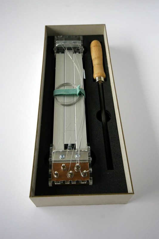 AluZith experimental folding zither stringed instrument, designed and made by Irish sound artist Ed Devane for Anthony Kelly, improvising sound artist and Farpoint Recordings boss.